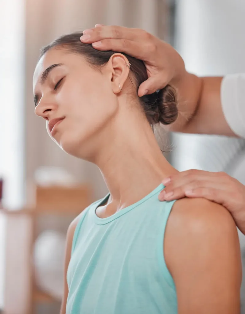 Neck pain physical therapy and woman with a physiotherapist for a consultation massage and medical help Wellness healthcare and girl at the chiropractor with a muscle injury in rehabilitation